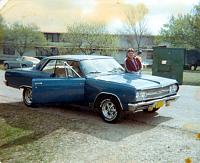 My first car.  1965 chevelle (no, thats not me)