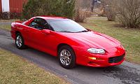 2002 B4C.  My second B4C, I also had a 2002 former Florida Highway Patrol Camaro.  This red car is a rare Camaro, factory six speed manual trans, factory Hurst shifter and factory chrome wheels. ...