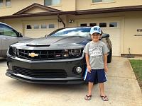 My youngest son with Daddy's car