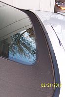 This is the way the rear bottom of the convertible top should be situated against the body. It should be even without any gap between the very bottom of the top and the body.