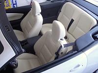 The creamy beige seats really brighten up the interior, with sharp contrast, when the top is up.