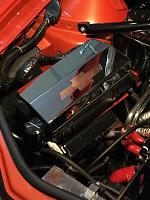 Copper bow-tie made for fuse box cover.