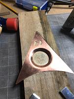 Form the plate in the wooden jig.