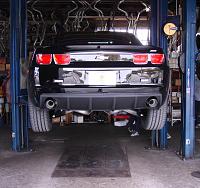 Mufflers Removed, Coming Down Off Of Lift.