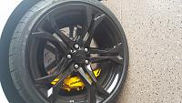 Corvette Gloss black wheels with Z06 slotted rotors and brakes.