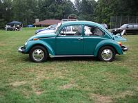 1974 VW Bug.  Was my dad's car and he passed away and left to my little girl.  Another 15 years and she can drive it :)  For now, Mommy will take care of it.