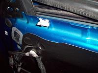 Door trim/weather stripping clip placed into the door before replacing panel.  You can see the raised weather stripping above.