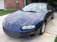 I love how the clouds reflect off of him... :-)