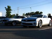 My 2010 with my buddy's 69 Camaro