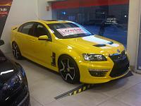 The GTS Beast of Burden.  There is a Pontiac G8 under all of that hazard yellow paint.