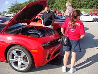 EarliestMemory models the red Camaro5 t-shirt