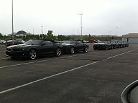 Six all black SS Convertibles on the way to Avis for rental abuse