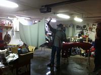 Primer coat going on the hood