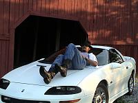 she ain't the only one with boots & a hat...