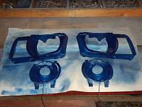 When Dennis got the headlights apart I got the crazy idea to paint the inside of the headlight housings blue. It's the same blue I've used on other trim, metallic blue from rustoleum.