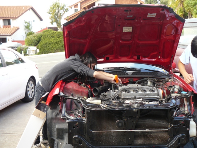 Name:  Working on Car.jpg
Views: 318
Size:  188.3 KB