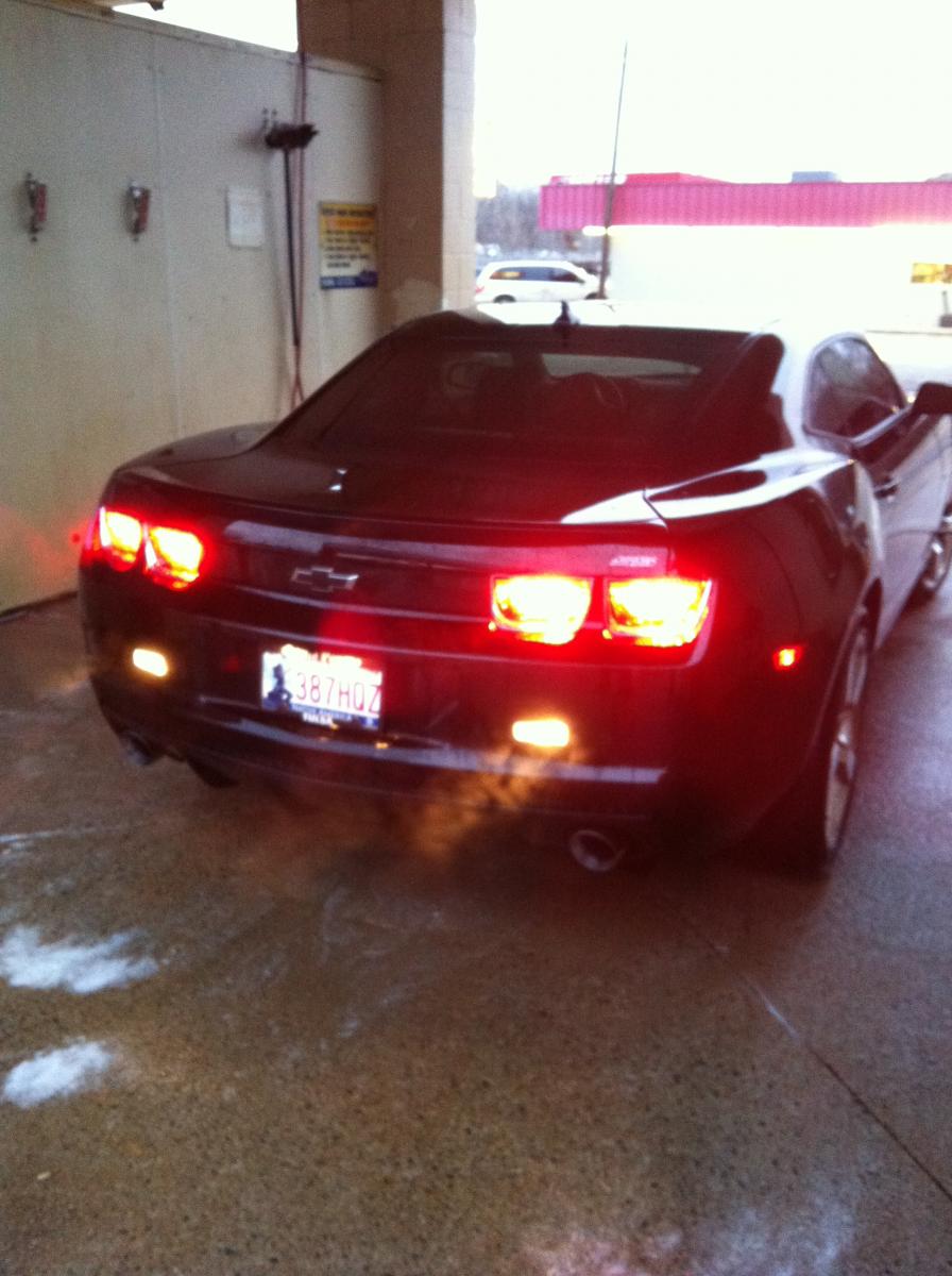 The smoke from the tailpipes