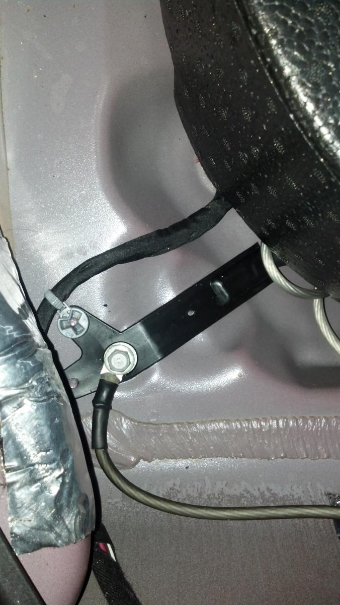 Ground connection for amp in trunk.