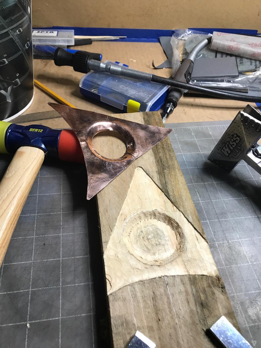 Create a jig to form the round indentation on the plate. Used the foil template plate to create working pattern.