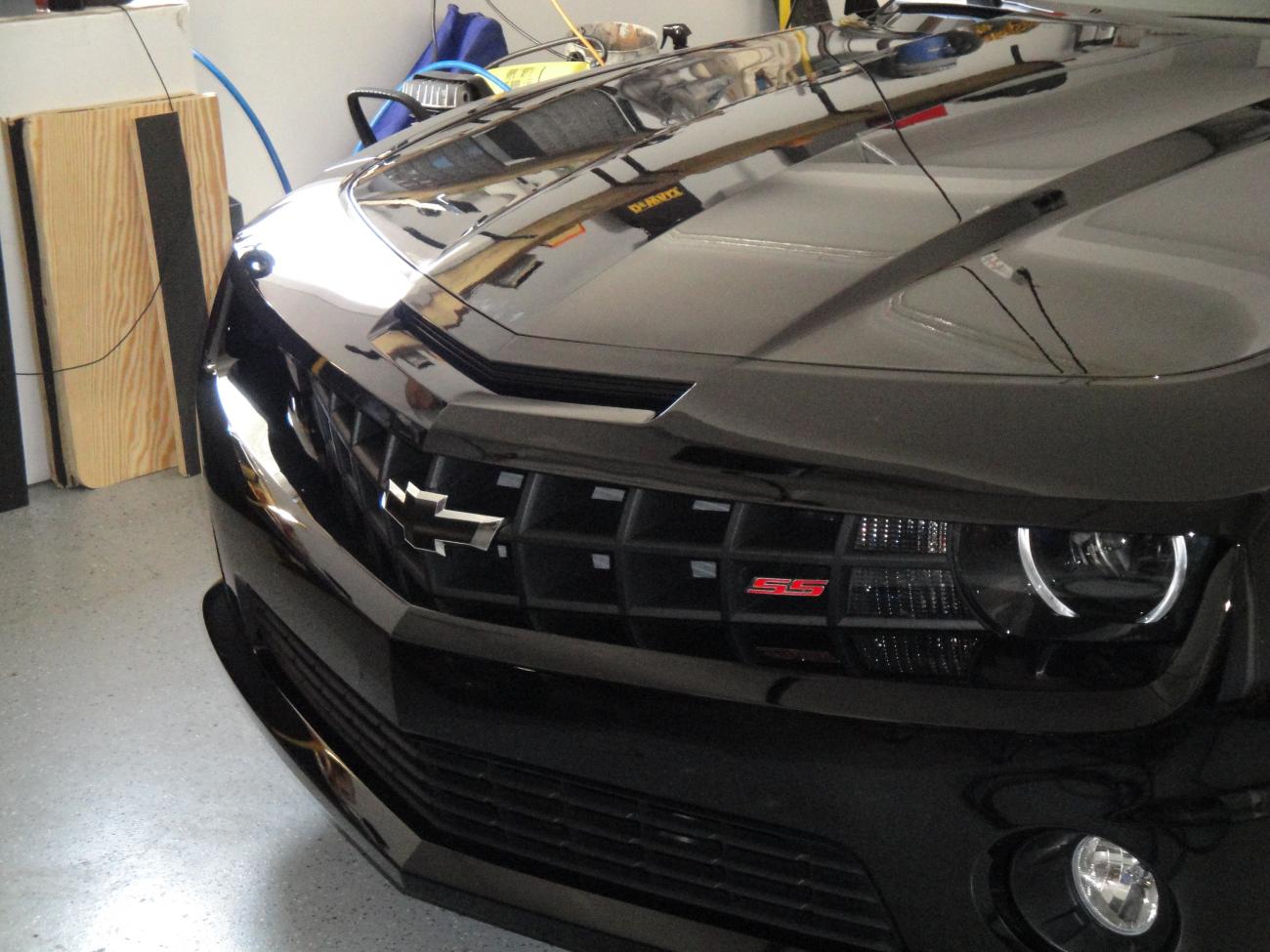 Blacked out Front Bow tie 
Stealth Bulbs for the Blinkers