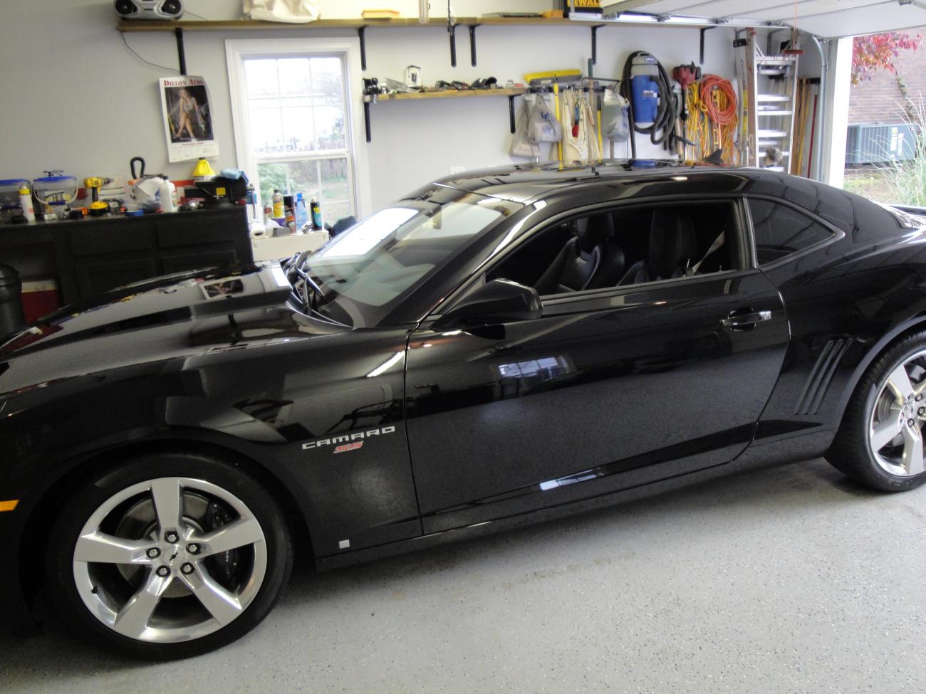 Badged the fenders with a "Red SS"
which indicates RS\SS for those not aware of this little fact
(Should have come that way from the Factory)
Blacked out the Bow-tie in the center of the rims
Next mod is Black Gorilla Lug nuts when I get a chance to take the tires off