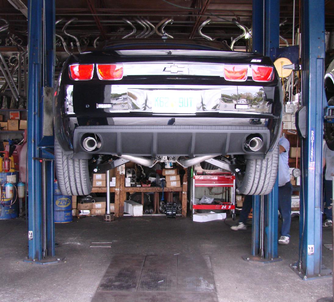 Mufflers Removed, Coming Down Off Of Lift.