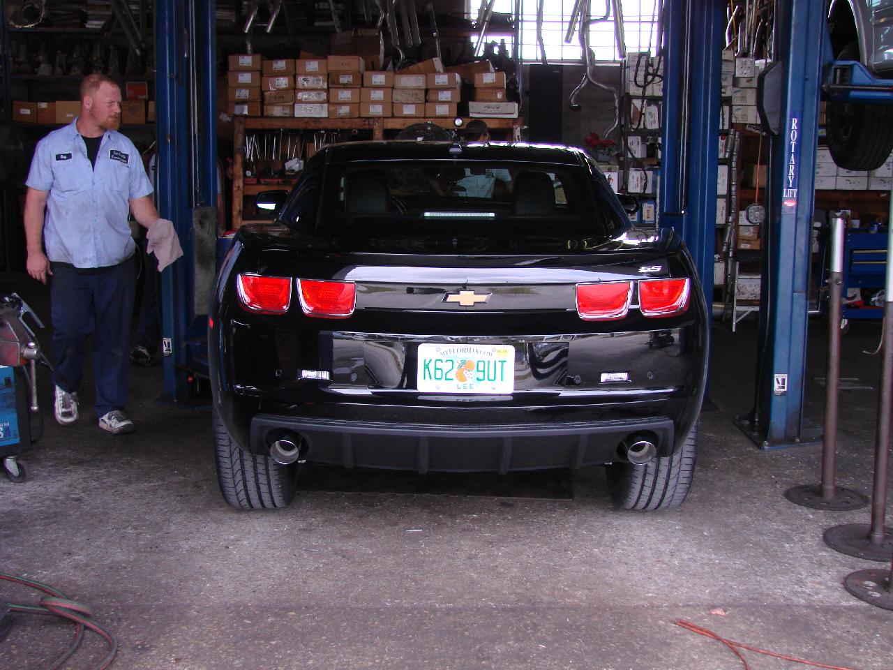 Mufflers Removed, Coming Down Off Of Lift.