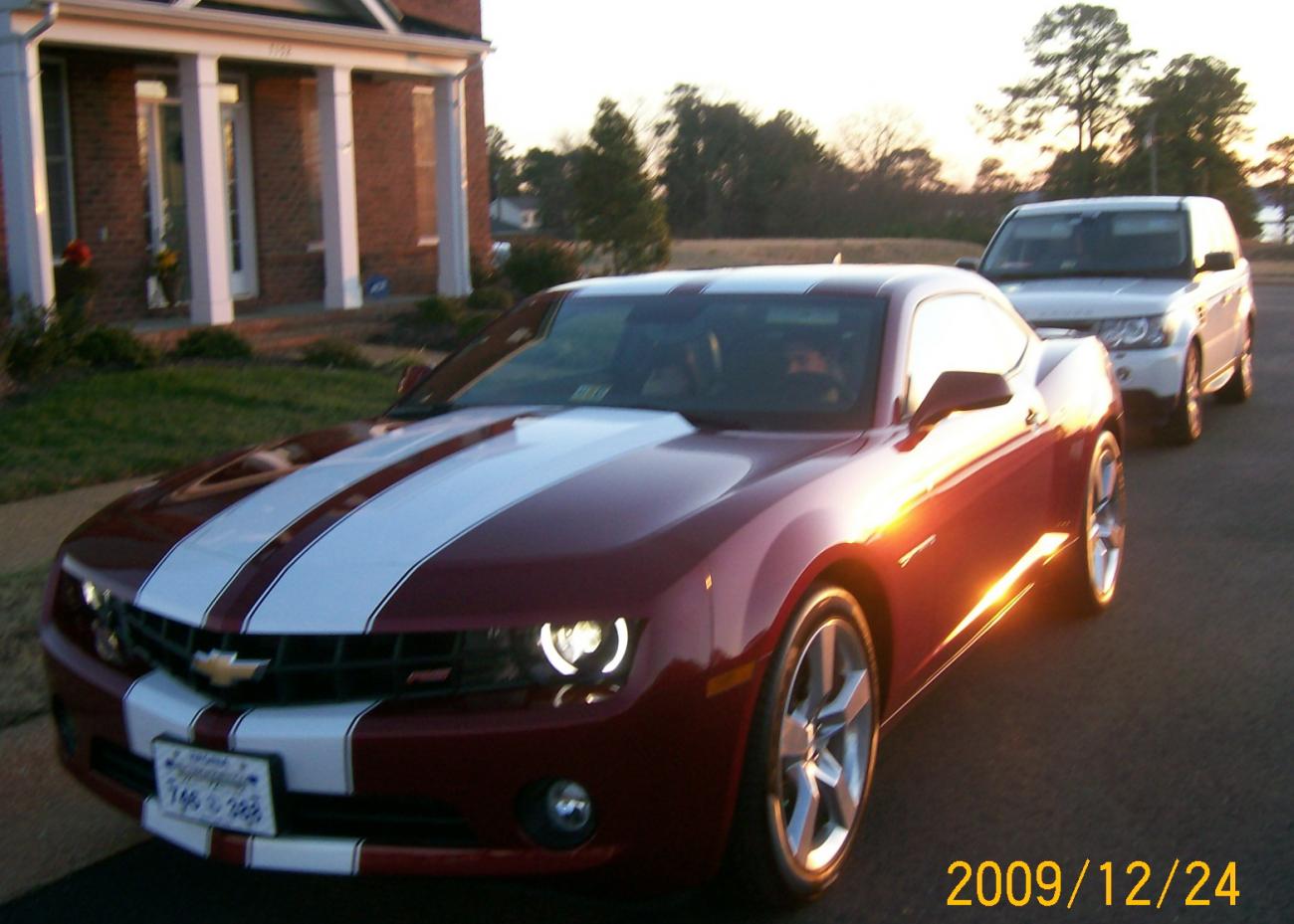 With the Rang Rover in the backround.