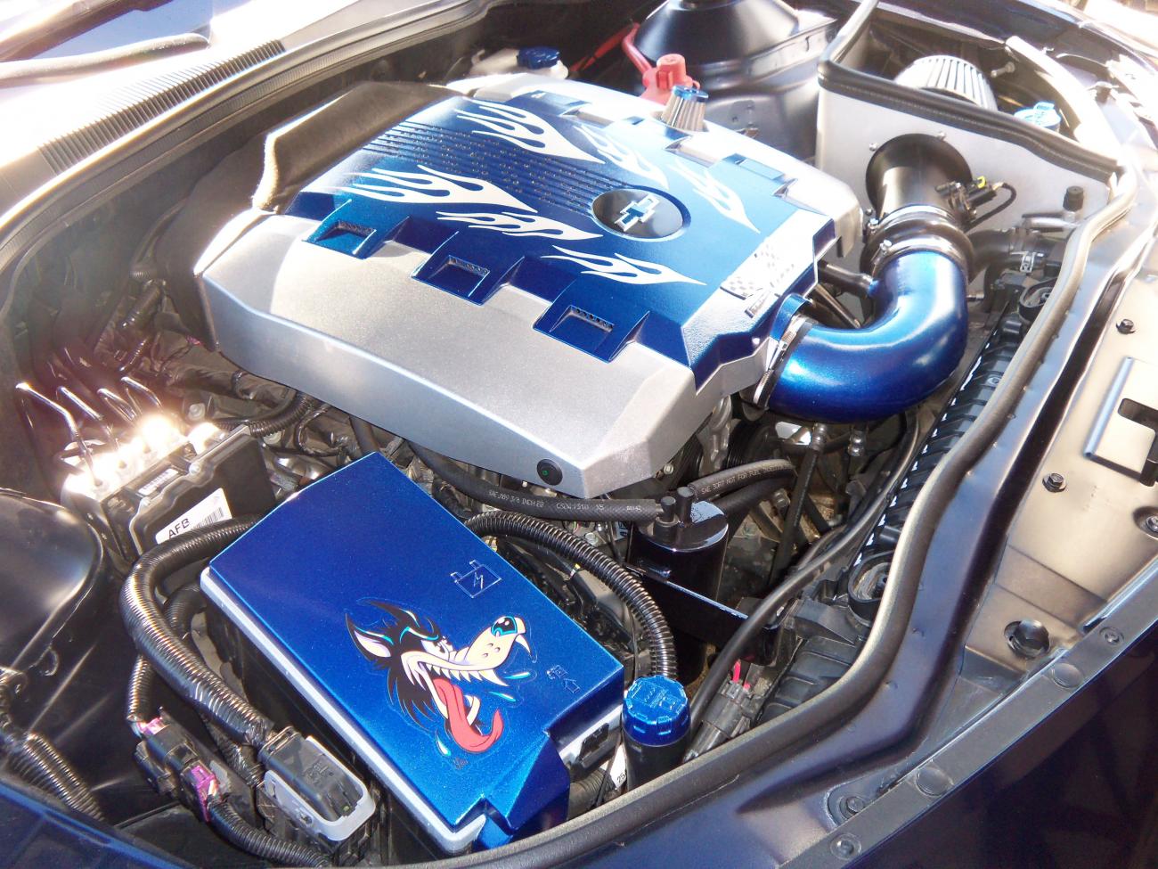 by the end of summer 2011 my engine compartment looks like this. I've done all the paint/decal work myself, added the CAI and catch can.