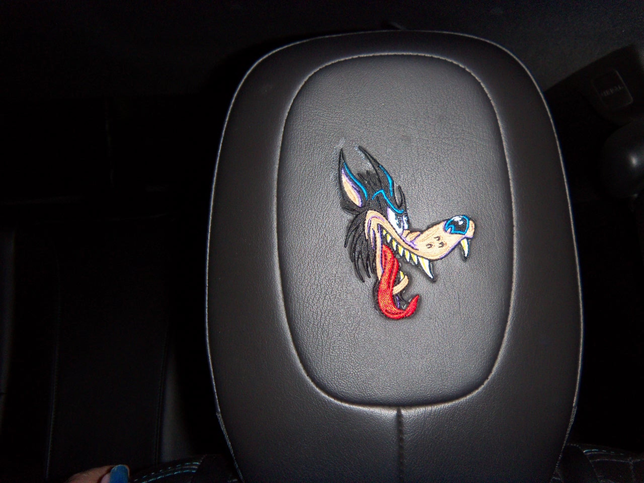 following the "raised by wolves" theme, I added big bad wolf to my head rests. a modest cost, since the patches were under $5.00 and are held on with super glue.