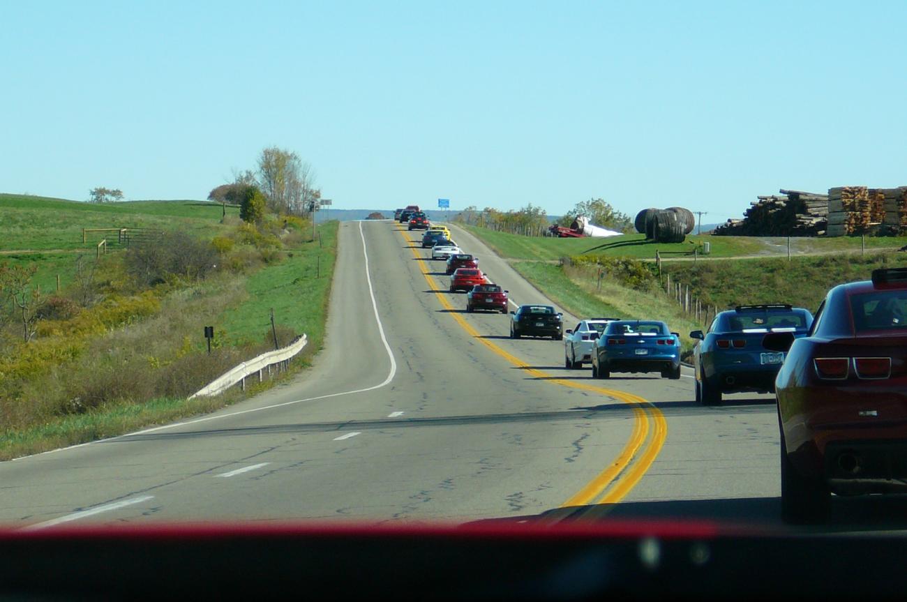 camaros in single file on the road