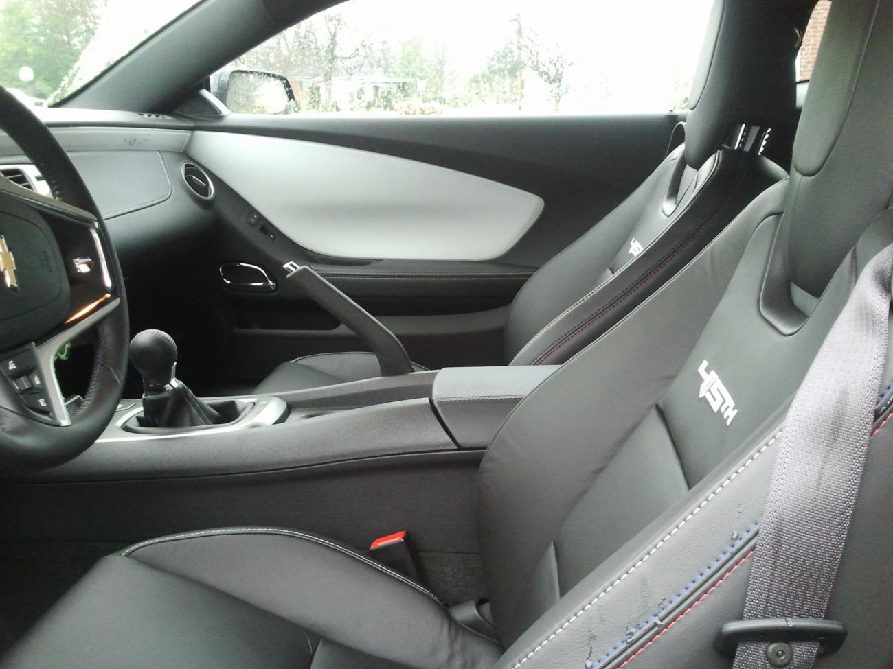 45th Anniversary comes with the colored interior side panels. It has an ice blue light across top of white that reflects down and makes entire interior glow.